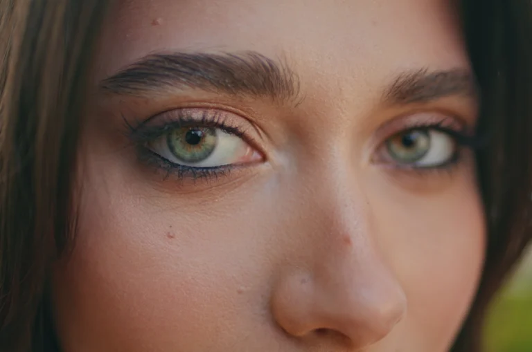 woman's eyes with makeup